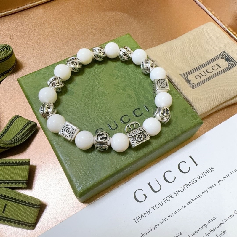 G*u*i bracelets